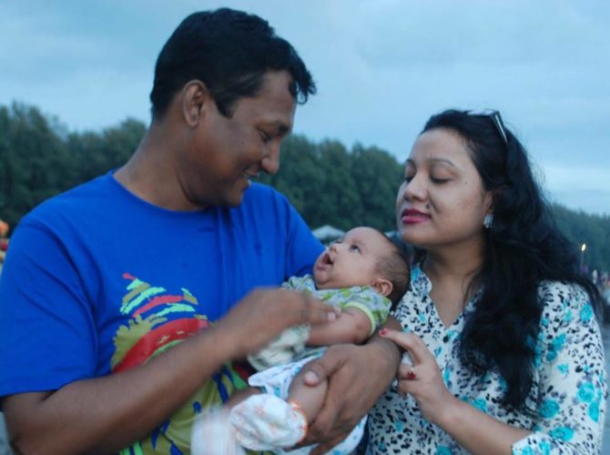 With her husband & daughter