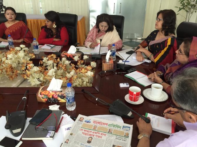 With the policy makers at a round table meeting on women's right