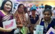 Displaying her health education tools among the adolescent