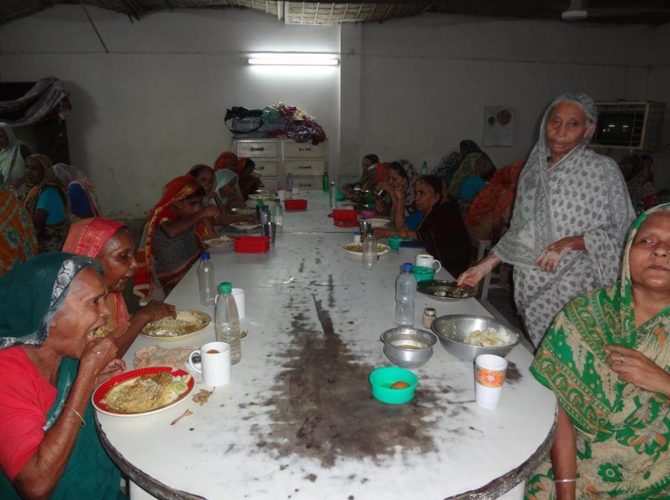 Distributing lunch at an old home of Gazipur