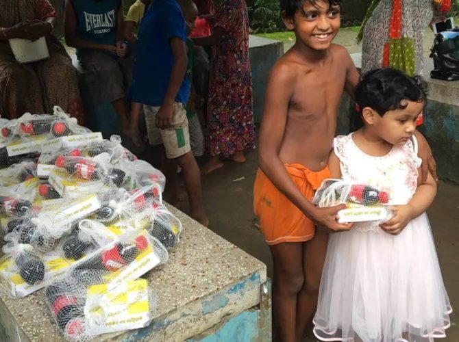 Distributing lunch to the underprivileged children